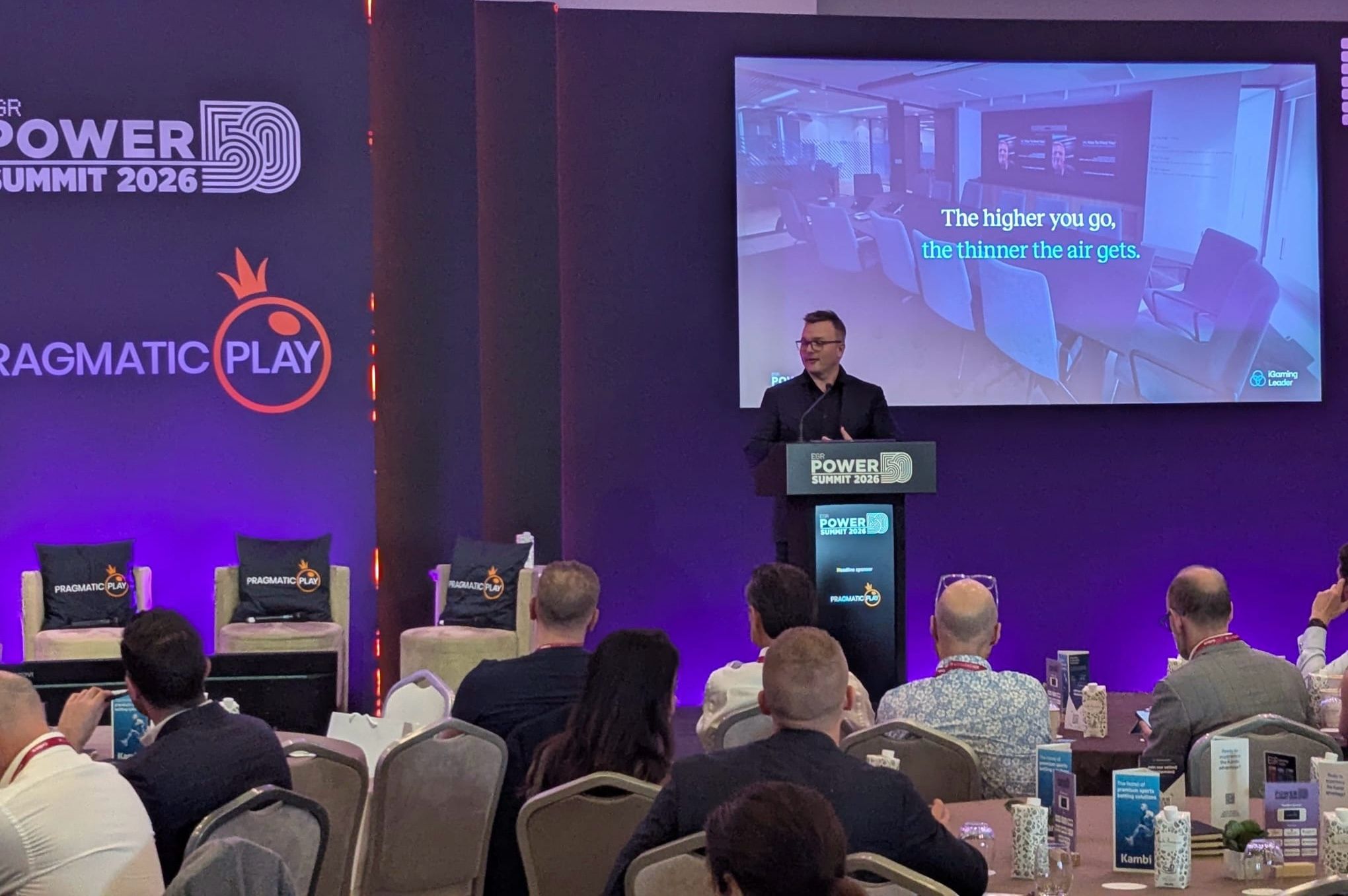 Leo Judkins opening the session from the stage.